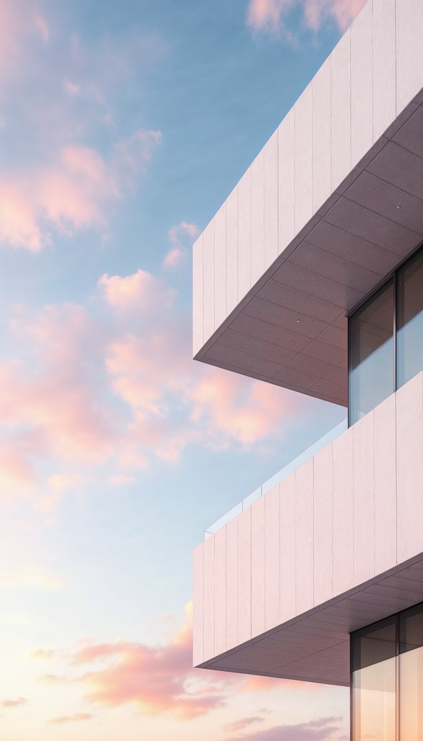 Modern office building with stacked cantilevered floors and white stone panels against a pastel sunset sky